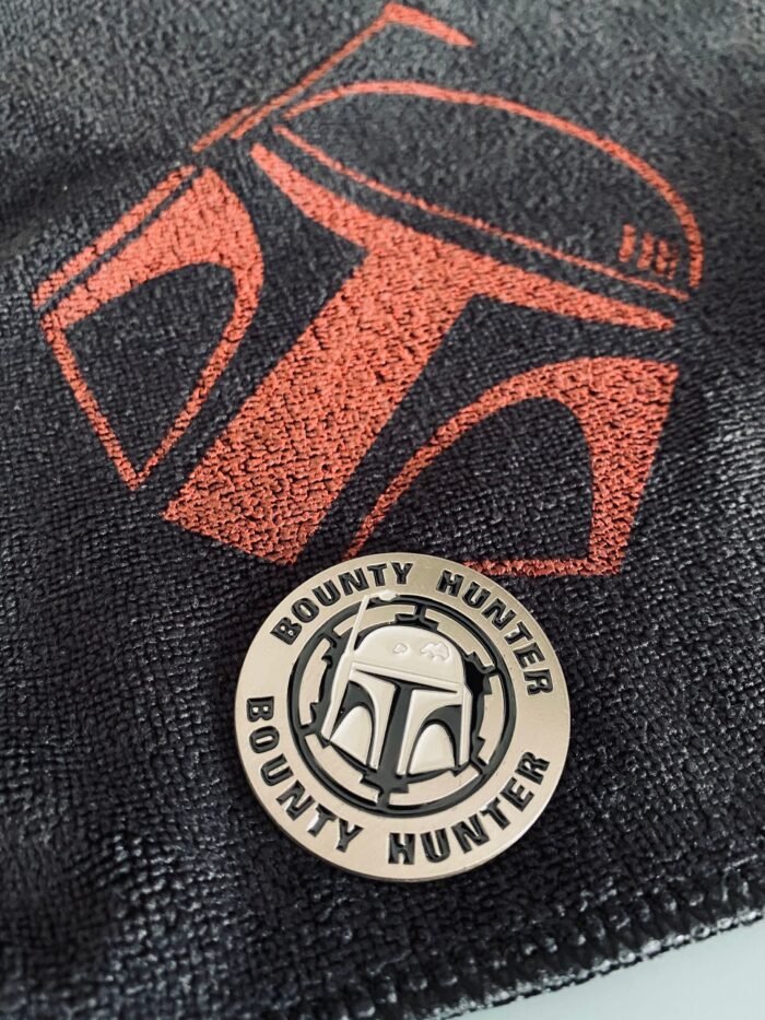 Golf towel bounty hunter and ball marker